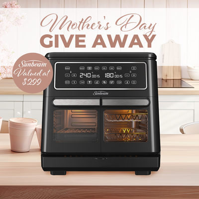 Mother’s Day giveaway ad with a black Sunbeam air fryer valued at $299 on a kitchen counter, next to coffee cups. At Bi-Rite Home Appliances. 