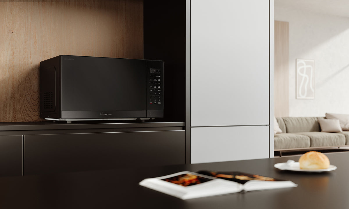 Hisense Microwave in a modern kitchen cutout in dark stainless steel