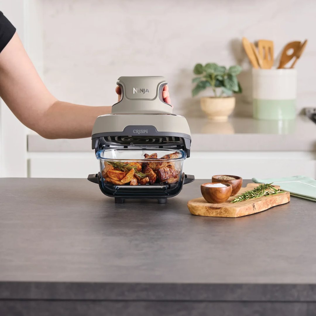 Ninja Crispi cooking meal in glass container