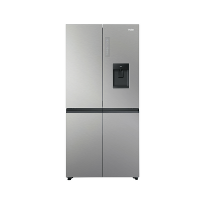 Front view of the Haier 507L quad door fridge with the doors closed in a satina finish, showing a water and ice dispenser and a flat door design.