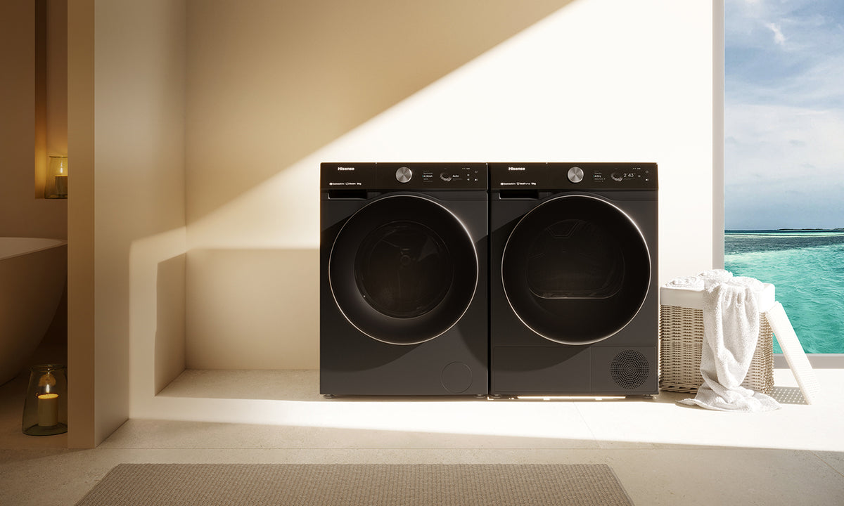 Hisense Washing Machine & Dryer both in Dark Stainless Steel in a modern laundry room