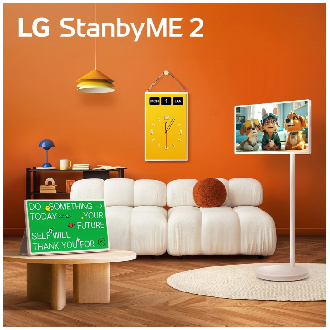 Living room with white sofa, table, and decorative items against an orange wall with 'LG StanbyME 2' text.
