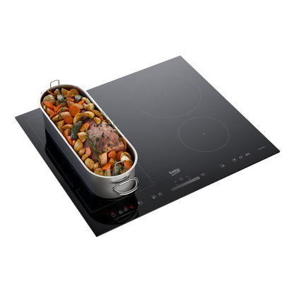 A modern Beko 60cm Induction cooktop with LED controls in use. A pot in on the cooktop. A silver pot with roasted veggies and meat in it. 
