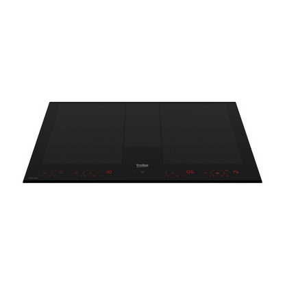 A modern Beko 60cm black glass induction cooktop with red LED touch controls is shown in use. Pictured at an angle 
