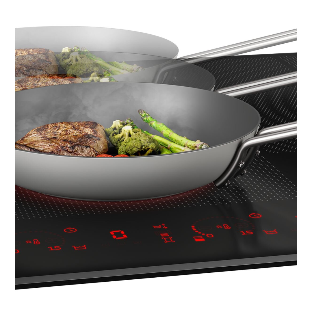 Beko 90m 6 zones Induction Cooktop with luminous controls pictured with a pan on it 