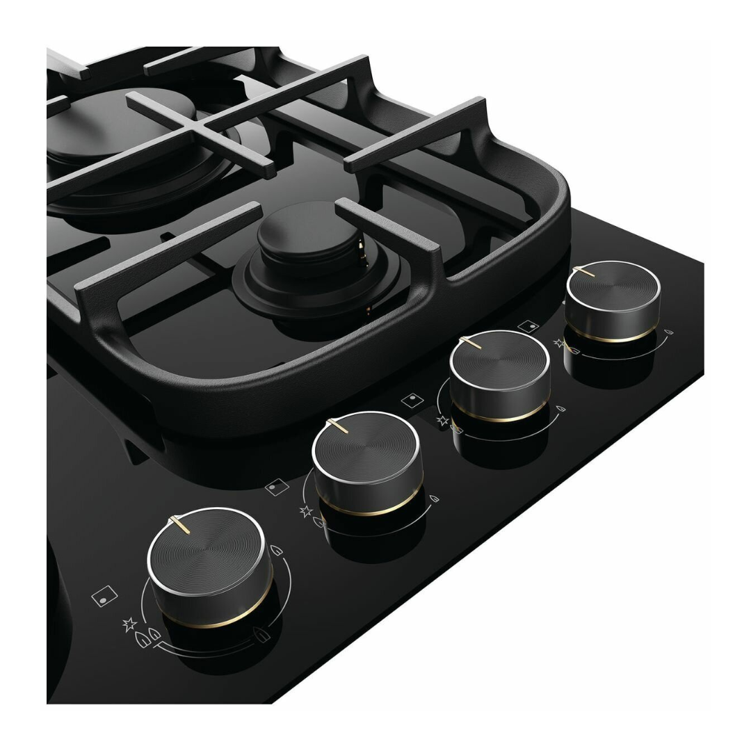 Angled view of the Electrolux ceramic gas cooktop, showing the control knobs and the two right trivets and burners.