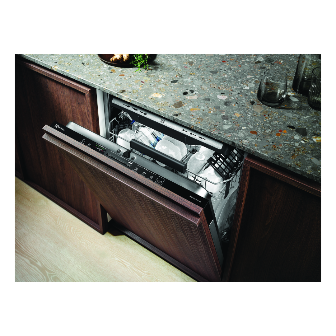 Angled view of the Electrolux 60cm fully integrated dishwasher with a wooden finish in a modern kitchen setting with the door half open showing some of the top basket and the touch control panel.