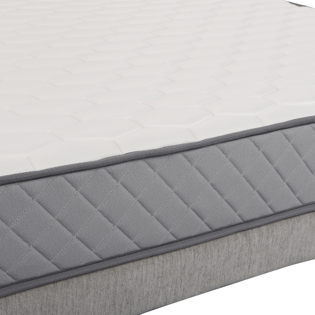 DreamRite grey and white mattress on a with a white background