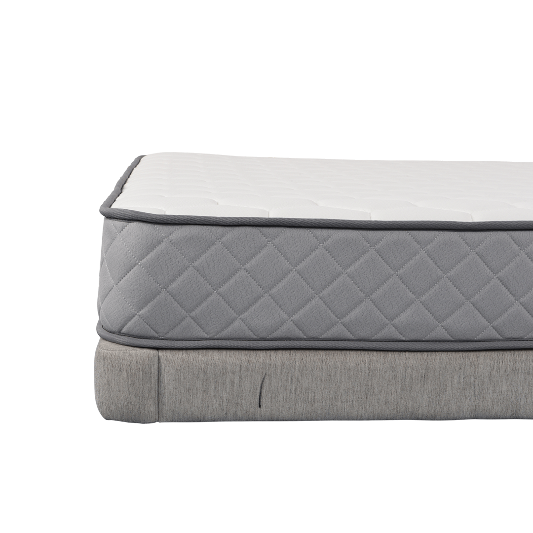 DreamRite grey and white mattress on a white background