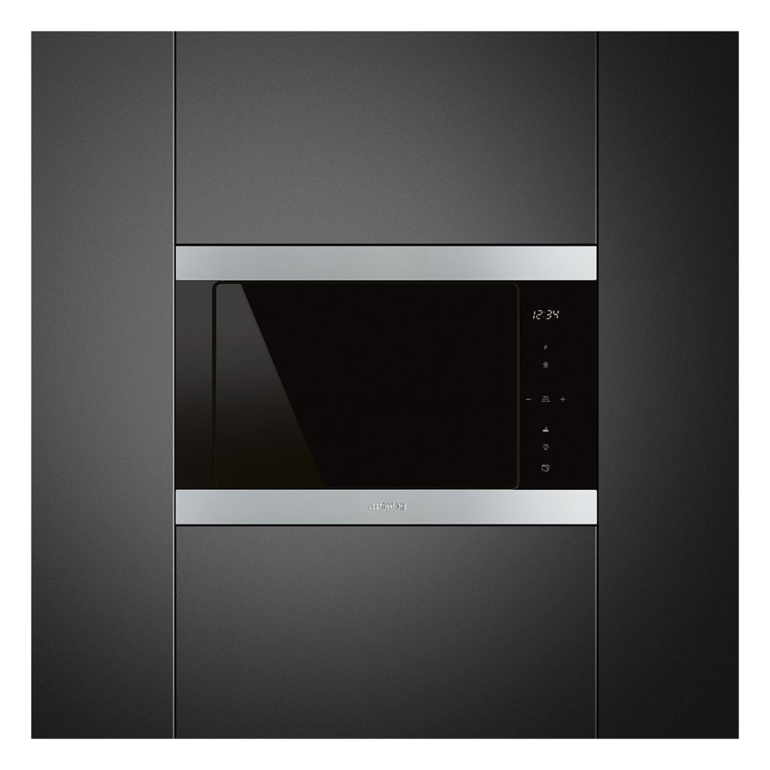 Smeg Stainless Steel built-in microwave oven with silver trim on a black background