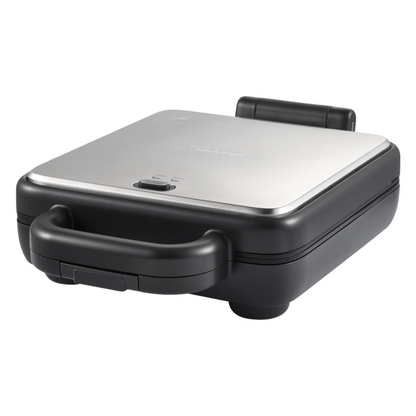 Angle view of a closed Sunbeam sandwich press with stainless steel lid, showing its compact profile and sleek design.