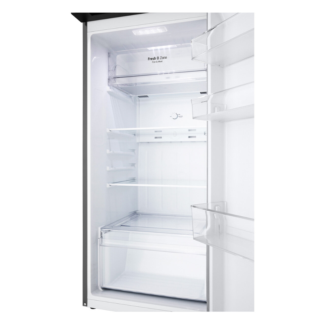 Empty LG top mount refrigerator with open door on a white background