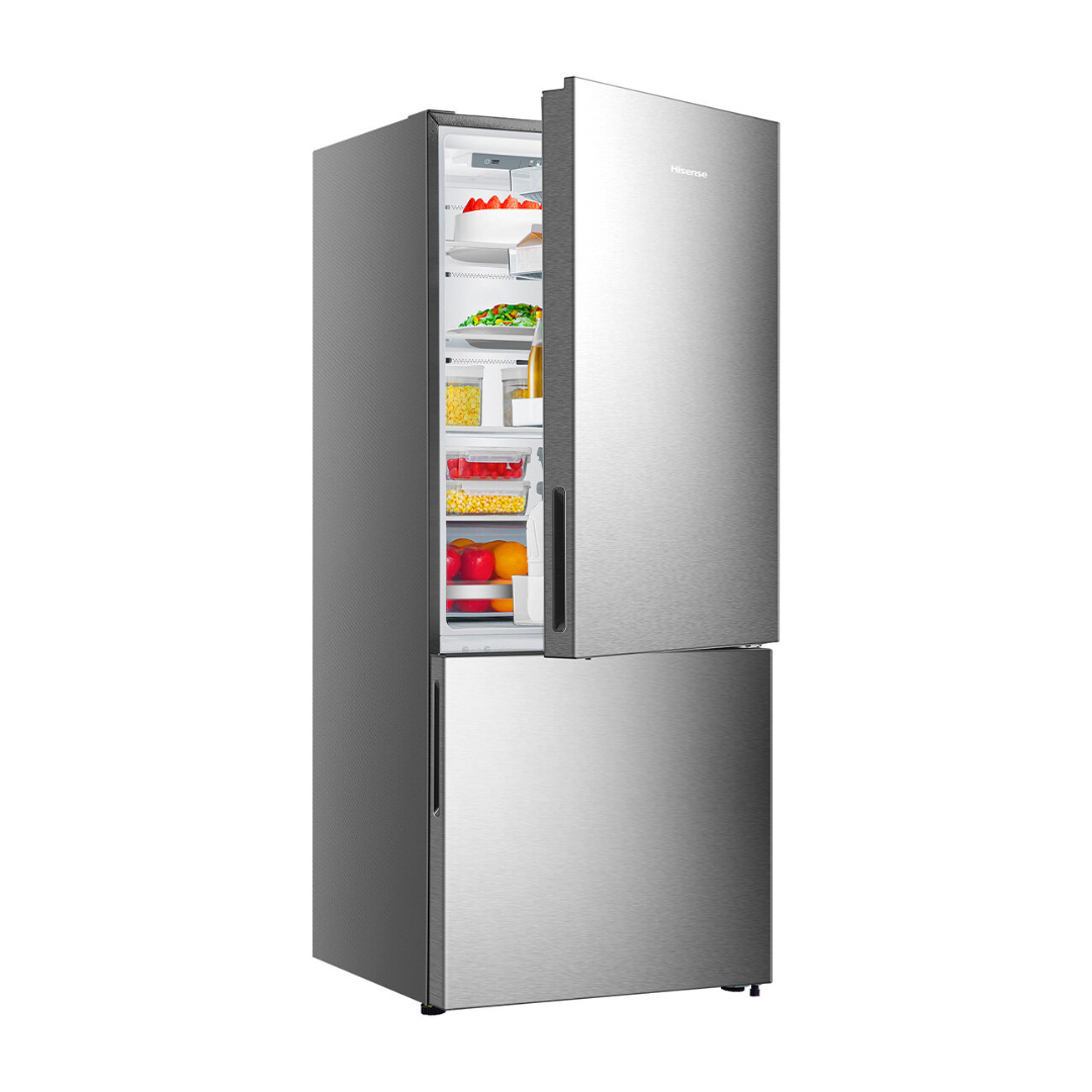Angle view of the Hisense 417L bottom mount fridge in a silver finish with the door slightly open, showing organised shelves and pure flat door design.