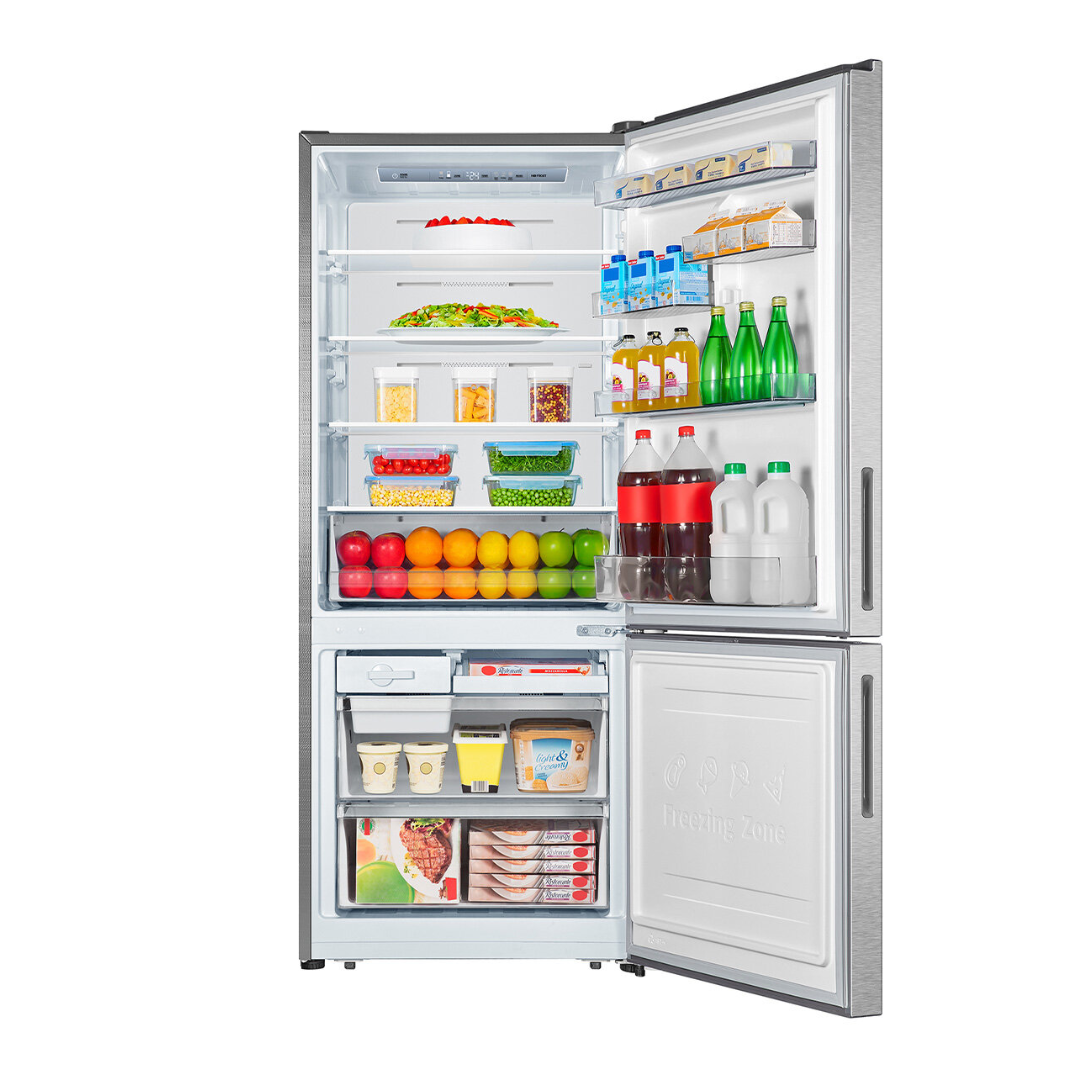 Front view of the Hisense 417L bottom mount fridge in a silver finish with the door open, showing organised shelves, fresh produce draw, door bins and freezer compartments.