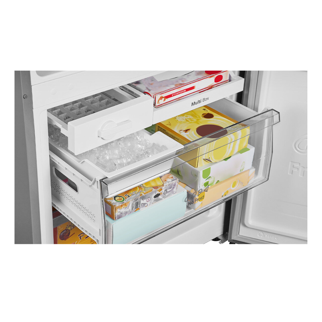 Close up view of the freezer compartment in the Hisense 417L bottom mount fridge, showing the no frost draw, multi box draw and the ice tray compartment.