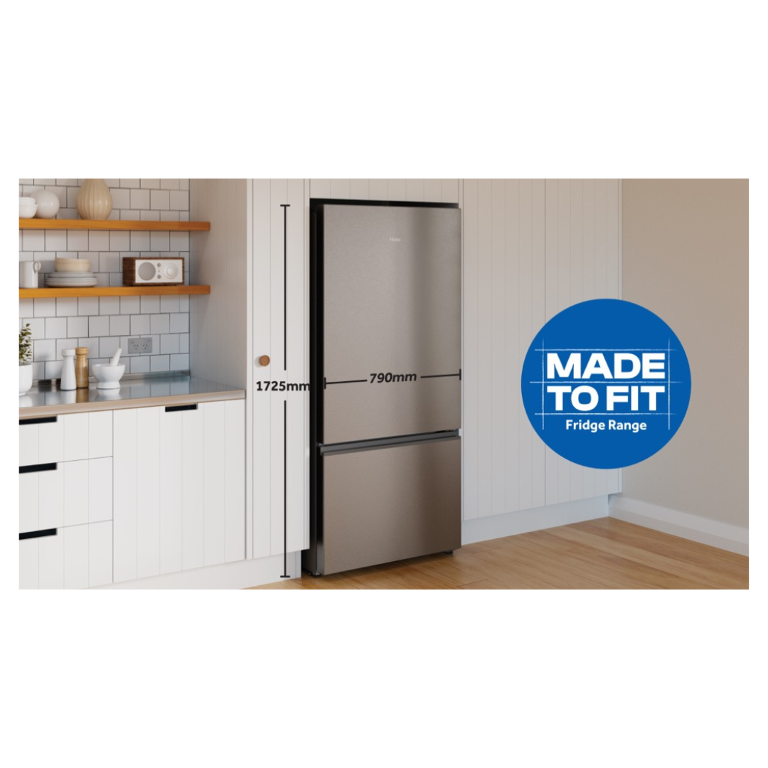 Haier Bottom Mount Fridge in Satina in a modern kitchen setting with dimensions for reference