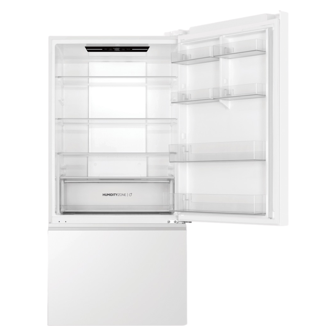 Haier Bottom Mount Fridge in White with the top door open showcasing its storage capacity