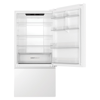 Haier Bottom Mount Fridge in White with the top door open showcasing its storage capacity