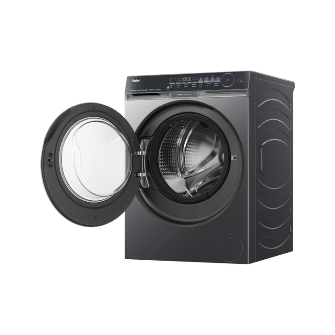 Black Haier front load washing machine with open door at an angle on a white background