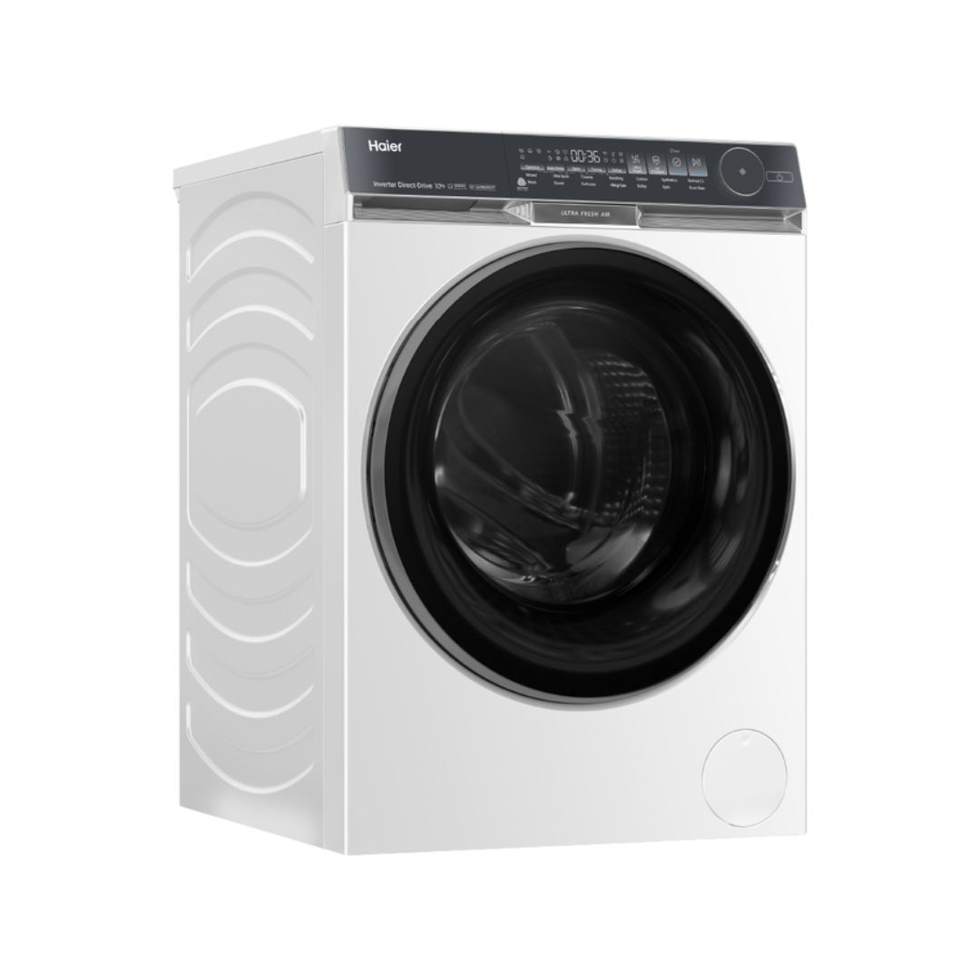 White Haier front load washing machine at an angle on a white background