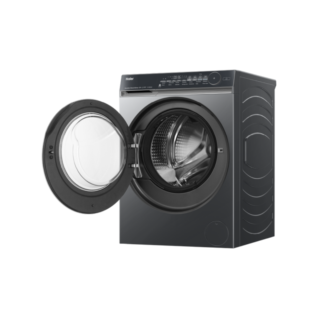 Black Haier front load washing machine with open door at an angle on a white background