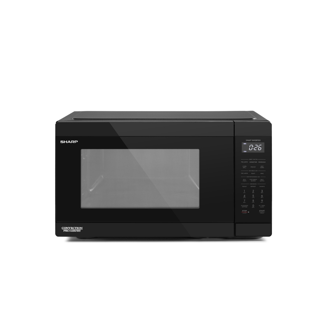 Black Sharp microwave oven with digital display on a white background