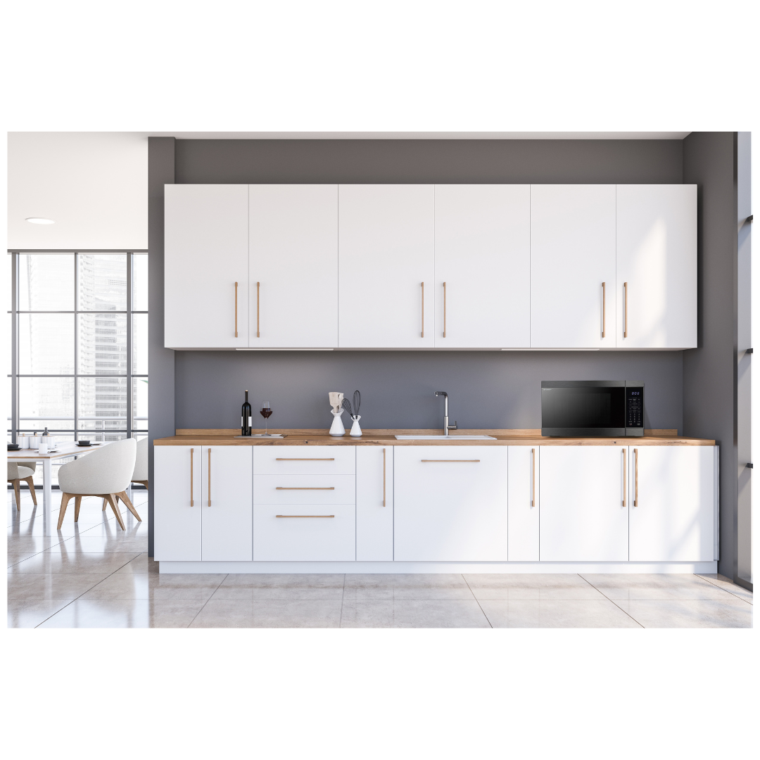 Modern kitchen with white cabinets, wooden countertops, and stainless steel appliances and a Sharp Microwave