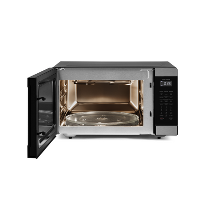 Black Sharp microwave oven with open door and stainless steel interior on a white background
