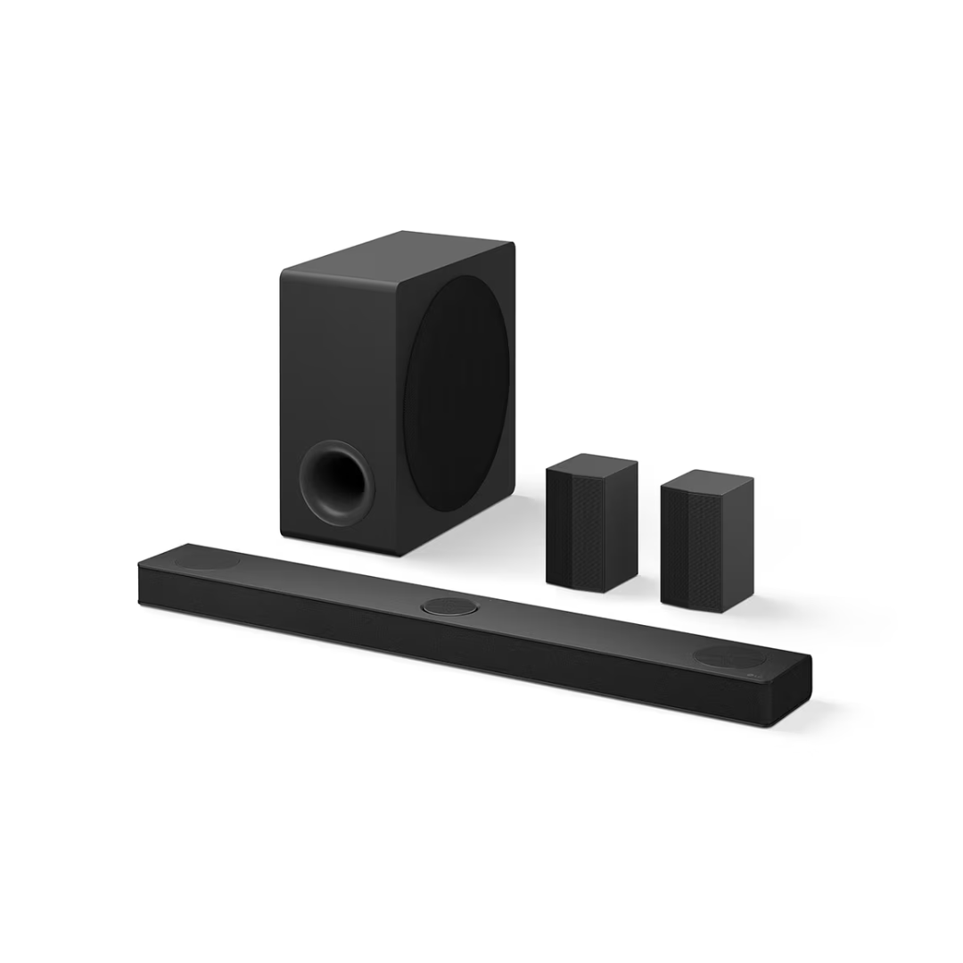 Angle view of the LG Home theater soundbar system, including the subwoofer, soundbar and rear speakers, showing the sleek design and good build quality. 