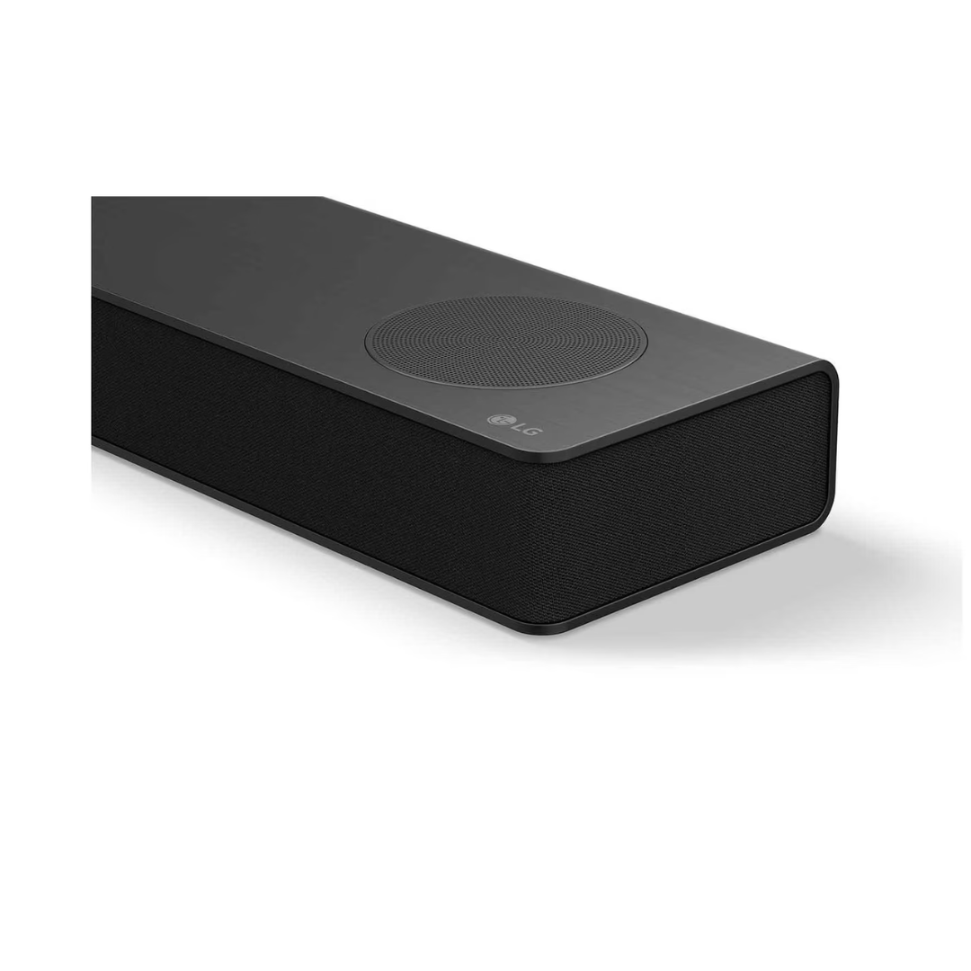 Close up view of the LG Home Theater soundbar, showing the end section of the sound bar with the LG logo and a mini speaker at the top. 