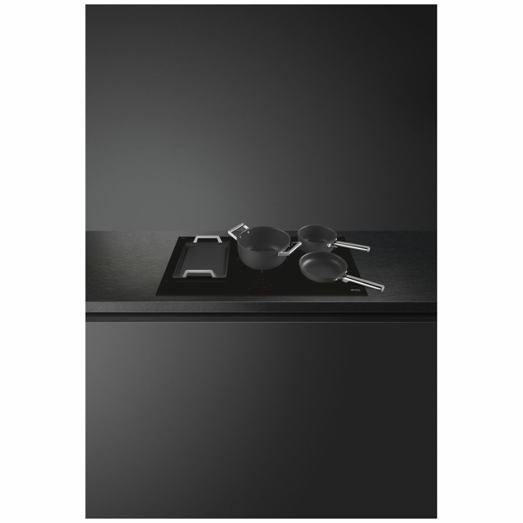 lifestyle picture of the Smeg 90cm Induction Cooktop with pots on top