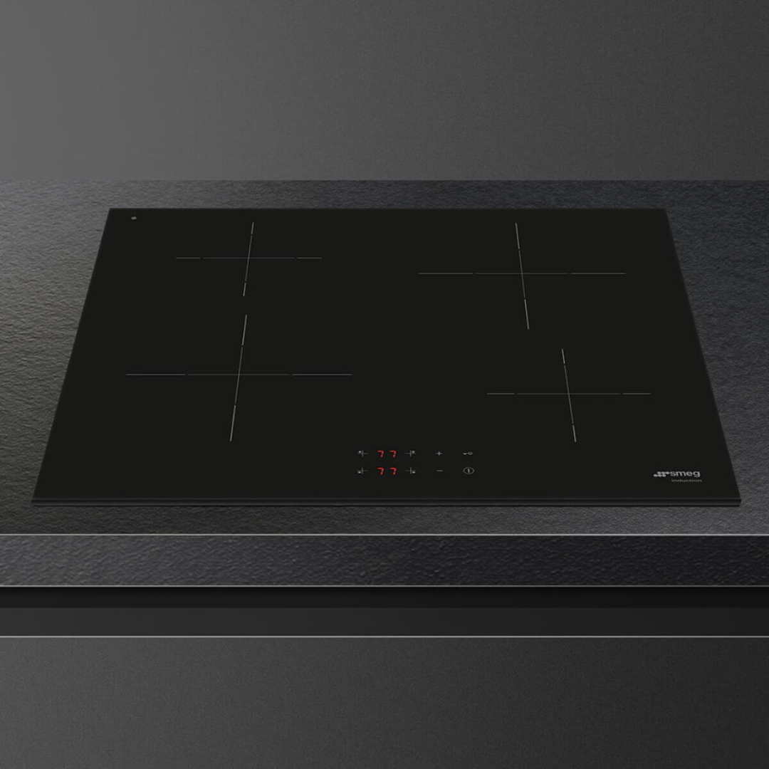 Smeg 60cm Induction Cooktop 4 zone induction cooktop lifestyle picture on a modern counter top