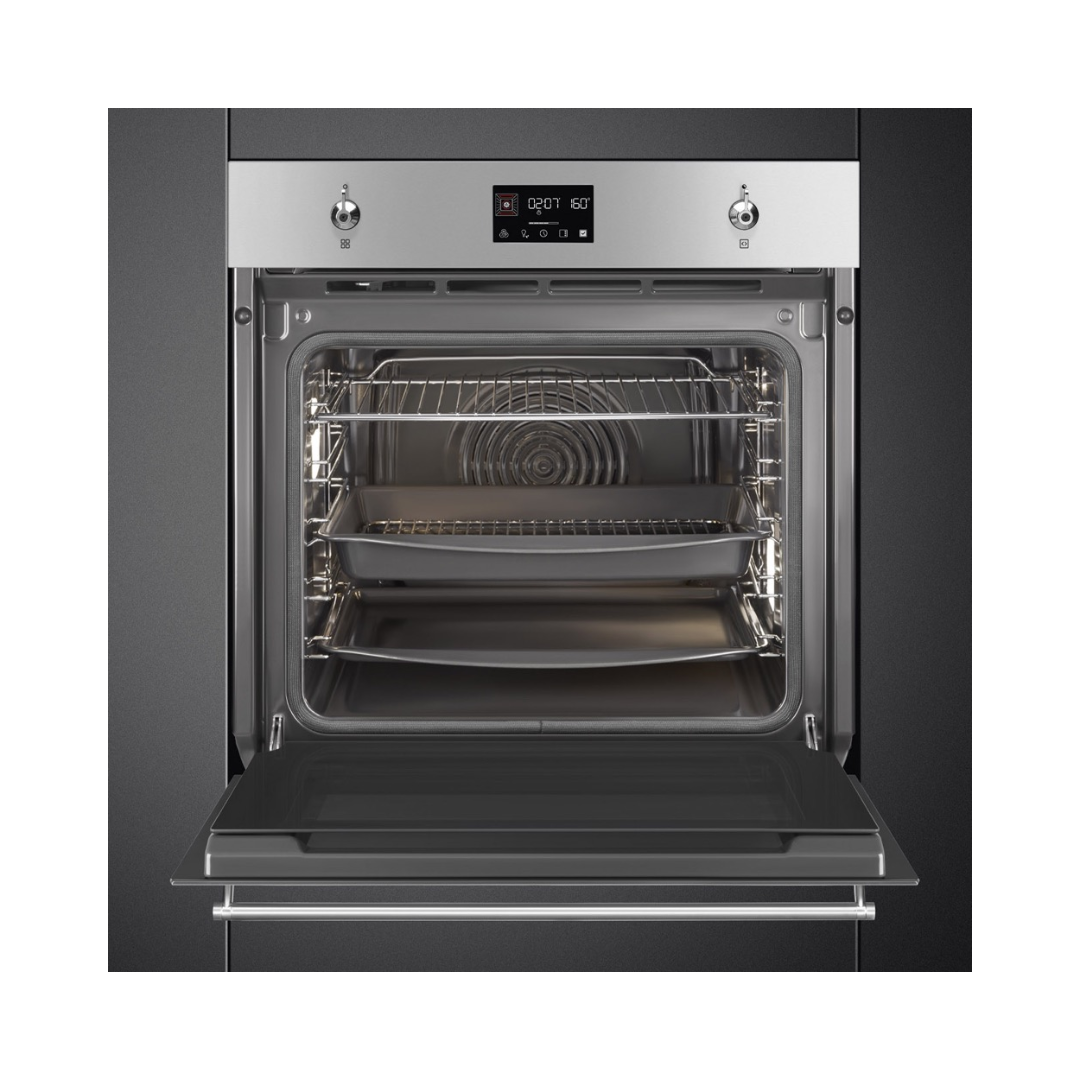 Smeg 60cm Pyrolytic Single Oven in a stainless steel finish with the door open showcasing it's capacity 