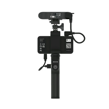 Rear view of Creality 3D scanner with visible certification labels, USB connections, QR codes, and power button on tripod handle for portable scanning and mobile device integration. 