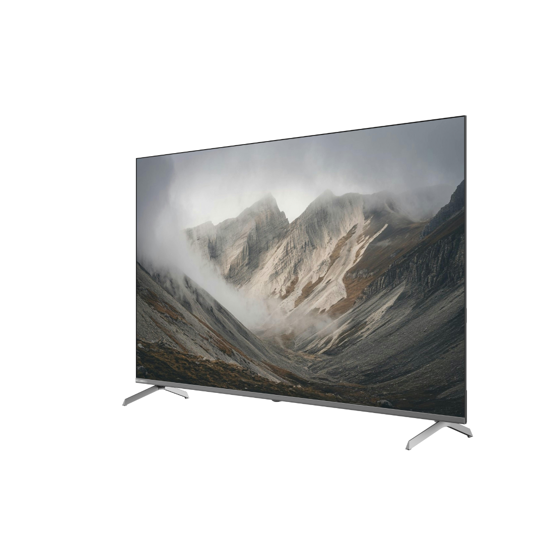 Angle view of the Chiq 65" QLED 4K Google TV, showing vivid colours and picture quality from and angle with a scenic mountain image displayed.