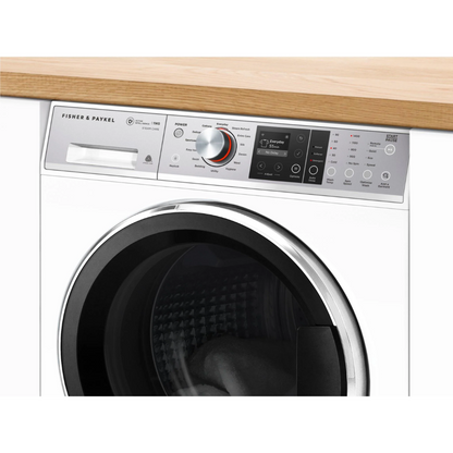 Angle close up view of the Fisher & Paykel 11kg front load washing machine, showing the top panel, with the controls, digital display, control knob and detergent dispenser.