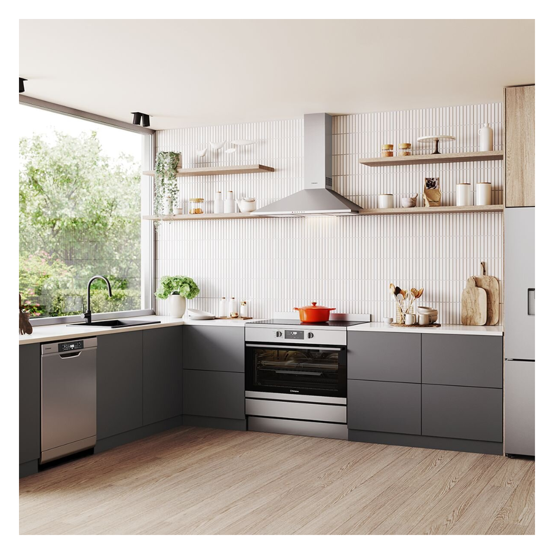 A lifestyle image of the Westinghouse 60cm Built under dishwasher in a modern kitchen setting.