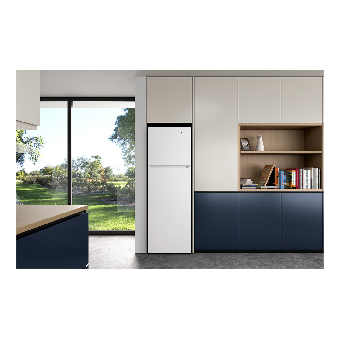 Front view of the Westinghouse 341L top mount fridge with the doors closed in a modern kitchen setting.